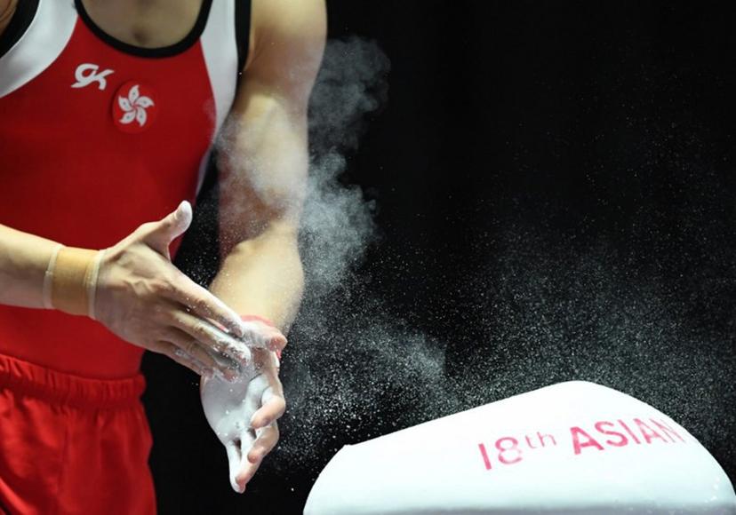 Hong Kong's Shek Wai Hung competes in the men's vault competition in the final of the artistic gymnastics event during the 2018 Asian Games in Jakarta on August 24, 2018.  PETER PARKS / AFP