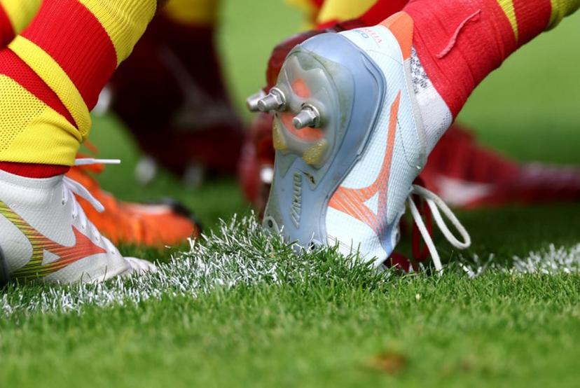 This photograph shows shoe studs on the pitch as Perpignan's players warm up ahead of the French Top14 rugby union match between Racing 92 and Perpignan (USAP) at Stade Dominique-Duvauchelle in Creteil, on the outskirts of Paris, on October 3, 2026.  FRANCK FIFE / AFP