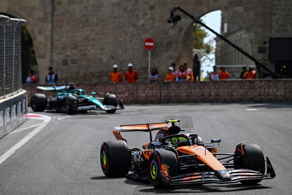McLaren's British driver Lando Norris (R) and McLaren's British driver Lando Norris drive during  a practice session of the Formula One Azerbaijan Grand Prix at the Baku City Circuit in Baku on September 19, 2025.  Ozan KOSE / AFP