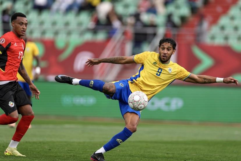 Mozambique's defender #17 Edson Sitoe and Gabon's forward #09 Pierre-Emerick Aubameyang vie during the Africa Cup of Nations (CAN) Group F football match between Gabon and Mozambique at Grand Stadium in Agadir on December 28, 2025.   FRANCK FIFE / AFP