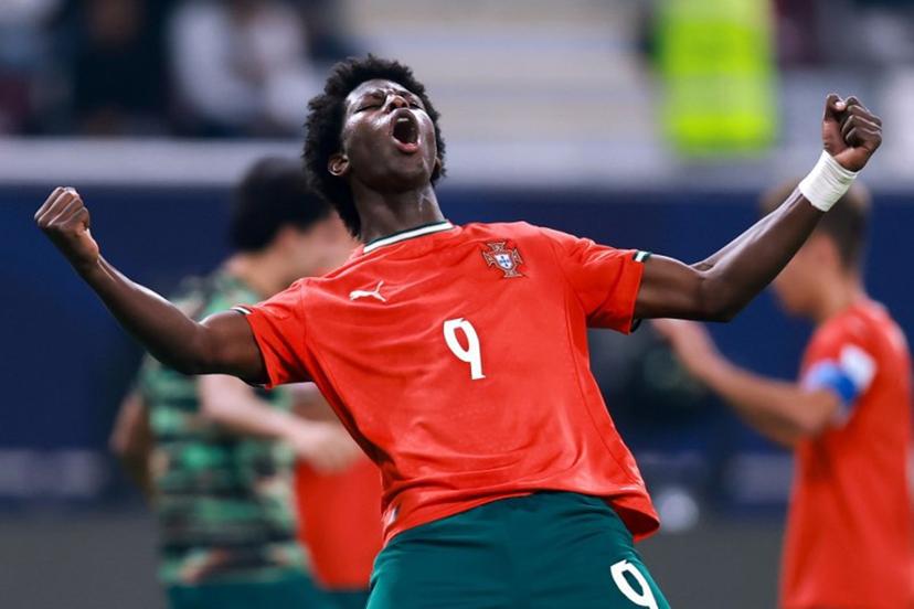 Portugal's forward #09 Anisio Cabral celebrates after scoring his team's first goal during the FIFA U17 World Cup final football match between Portugal and Austria at Khalifa International Stadium in Al-Rayyan on November 27, 2025.  Karim JAAFAR / AFP