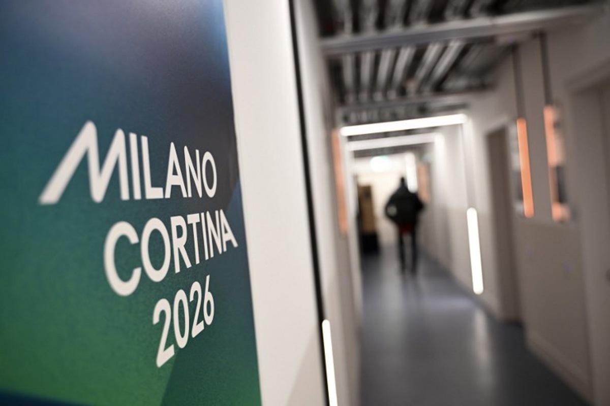 A logo is seen in the Team Italy quarters of the Olympic Village ahead of the Milano Cortina 2026 Winter Olympics in Milan on February 3, 2026.  PIERO CRUCIATTI / AFP