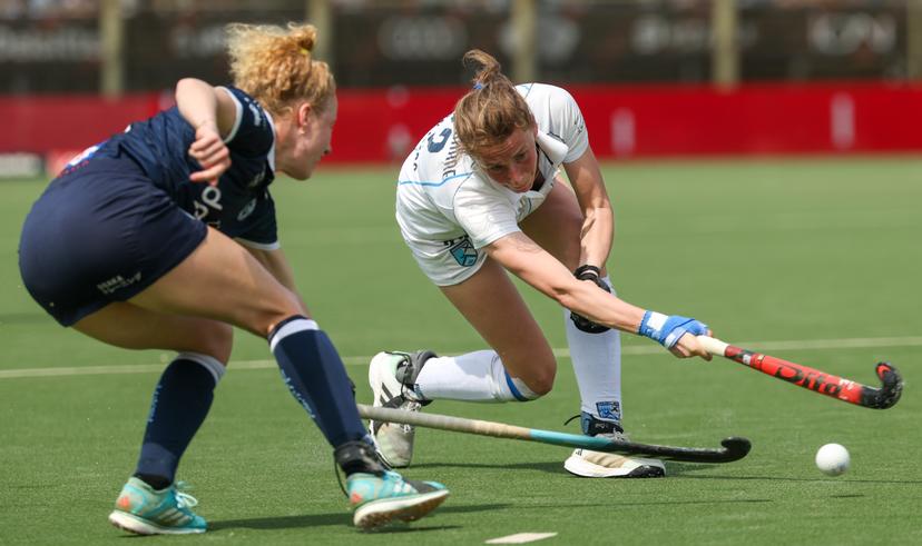 Gantoise's Michelle Struijk and Braxgata's Stephanie Vanden Borre pictured in action during a hockey game between Gantoise and Braxgata, Sunday 12 May 2024 in Antwerp, the return leg of the finals of the playoffs in the Belgian Hockey League women during the 2023-2024 season.  BELGA PHOTO VIRGINIE LEFOUR