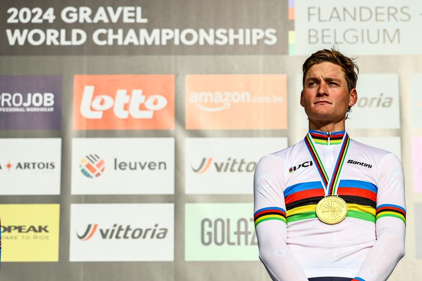 Dutch Mathieu van der Poel of Alpecin-Deceuninck celebrates on the podium after winning the men elite race at the UCI World Gravel Championships, Sunday 06 October 2024, in Leuven. BELGA PHOTO DAVID PINTENS