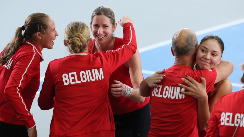 Belgian Magali Kempen and Belgian Sofia Costoulas celebrate with their teammates after winning the third game, a double game between Belgian pair Costoulas-Kempen and Turkish pair Aksu-Oz, in the Billie Jean King Cup Play-offs, between Belgium and Turkey, on Saturday 15 November 2025 in Ismaning, Germany. PHOTO BENOIT DOPPAGNE