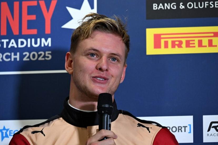 Former F1 driver and current WEC driver Mick Schumacher speaks during a press conference at Accor Stadium in Sydney on March 6, 2025, ahead of the Race of Champions Nations Cup.   Saeed KHAN / AFP