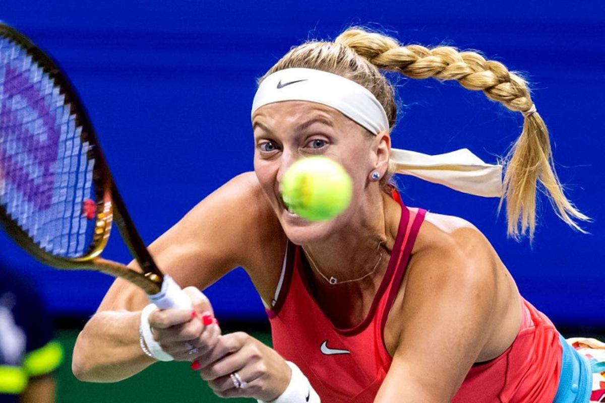 Czech Republic's Petra Kvitova plays a forehand return against Denmark's Caroline Wozniacki during the US Open tennis tournament women's singles second round match at the USTA Billie Jean King National Tennis Center in New York City, on August 30, 2023.  COREY SIPKIN / AFP