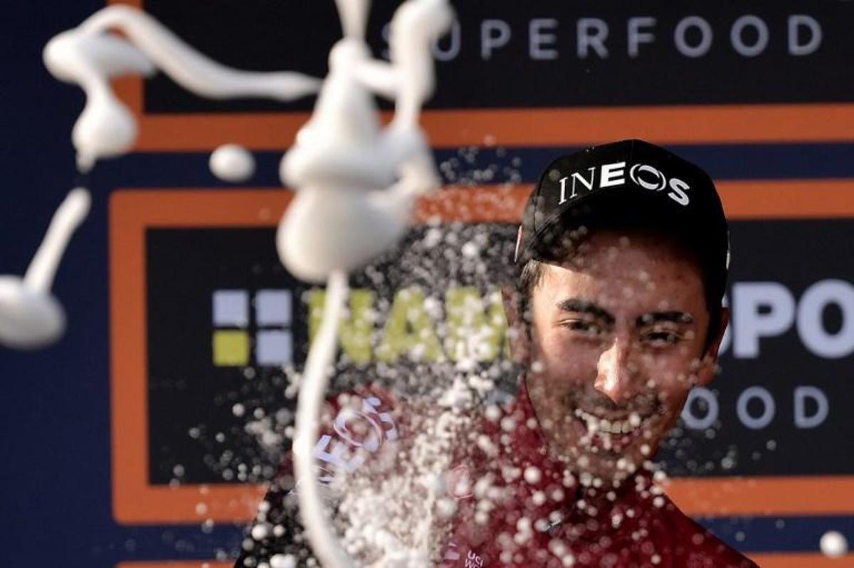 Colombian Ineos rider Ivan Ramiro Sosa celebrates his second place of the one-day semi-Classic Gran Piemonte cycling race, between Aglie and Santuario di Oropa, Biella, North of Turin, on October 10, 2019.  MARCO BERTORELLO / AFP