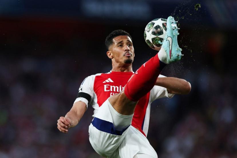 Arsenal's French defender #02 William Saliba controls the ball during the UEFA Champions League Semi-final First Leg football match between Arsenal and Paris Saint-Germain (PSG) at the Emirates Stadium in north London, on April 29, 2025.  Adrian Dennis / AFP