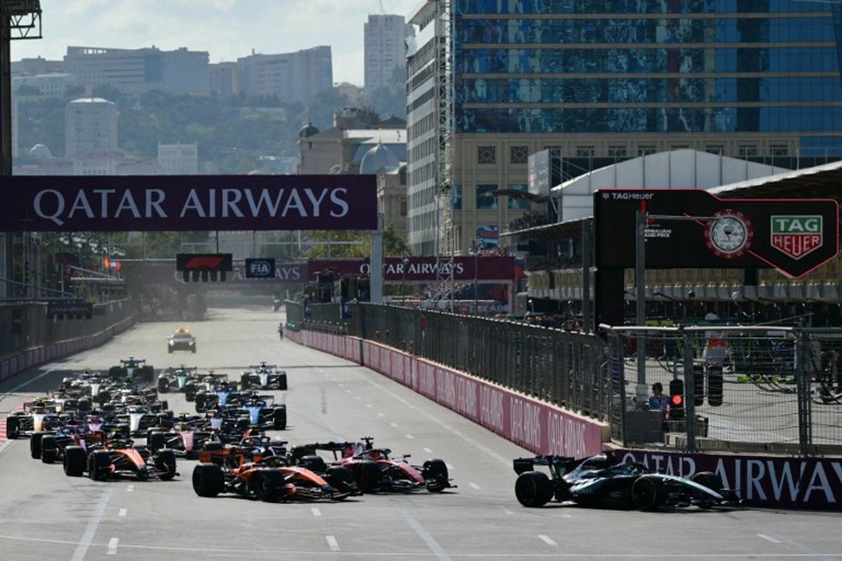 Mercedes' British driver George Russell leads at the start of the Formula One Azerbaijan Grand Prix at the Baku City Circuit in Baku on September 26, 2026.  Andrej ISAKOVIC / AFP