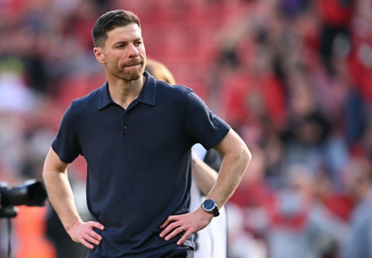 Bayer Leverkusen's Spanish head coach Xabi Alonso reacts after the German first division Bundesliga football match between Bayer Leverkusen and Union Berlin in Leverkusen, western Germany, on April 12, 2025.  INA FASSBENDER / AFP