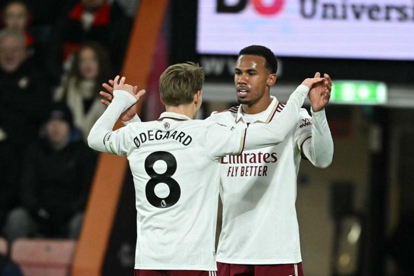 Arsenal's Brazilian defender #06 Gabriel Magalhaes (R) celebrates scoring their first goal to equalise 1-1 during the English Premier League football match between Bournemouth and Arsenal at the Vitality Stadium in Bournemouth, southern England on January 3, 2026.  JUSTIN TALLIS / AFP