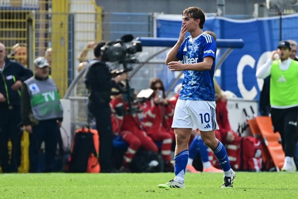 Como's Argentinian midfielder #10 Nico Paz celebrates after scoring his team second goal during the Italian Serie A football match between Como and Juventus at the Giuseppe Sinigaglia Stadium in Como, Italy on October 19, 2025  Piero CRUCIATTI / AFP