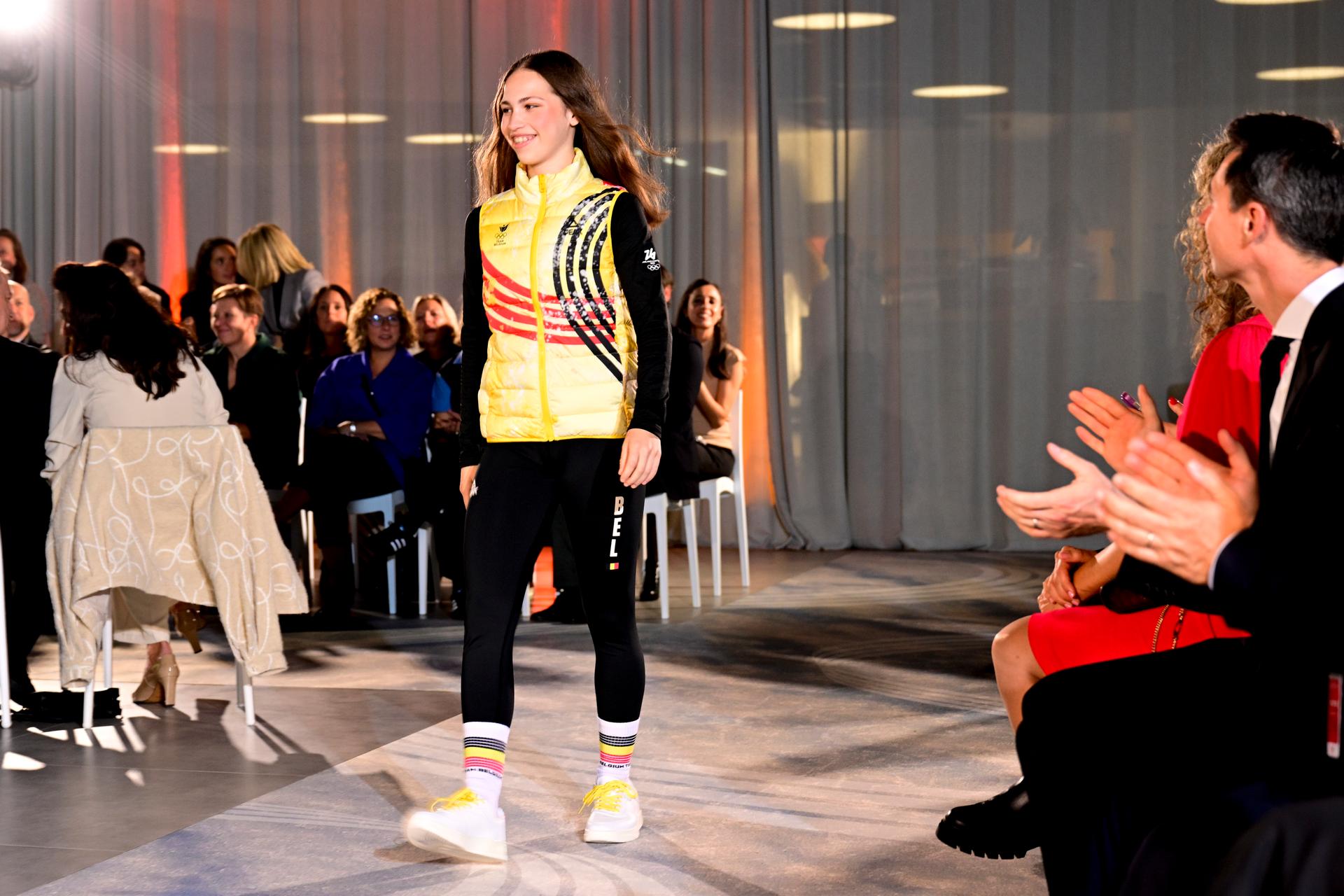 Belgian figure skater Nina Pinzarrone pictured on the catwalk during the presentation of the official Belgian outfit of 'Team Belgium' for the Milano Cortina 2026 Olympic and Paralympic Games, at the gala event 'Styled to the Winter Games' of the BOIC-COIB Belgian olympic committee, Thursday 16 October 2025, in Zaventem. BELGA PHOTO DIRK WAEM
