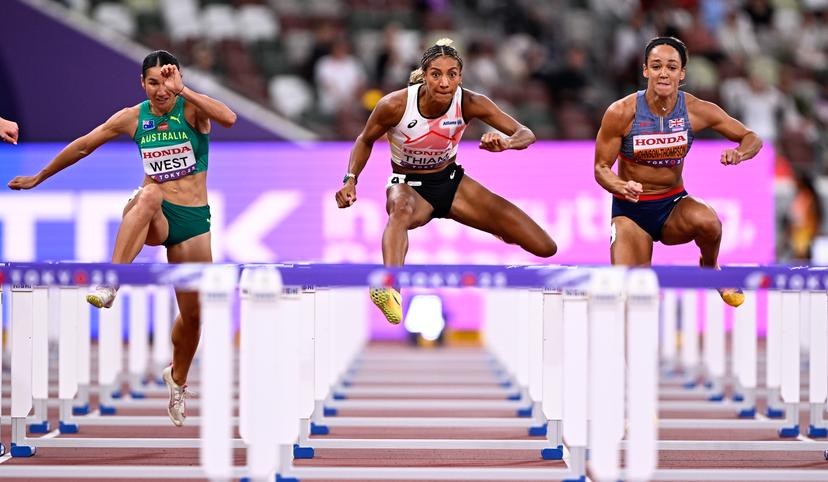 Belgian Nafissatou Nafi Thiam and Great Britain's Katarina Johnson-Thompson pictured in action during the 100m hurdles event of the women's Heptathlon competition, at the World Athletics Championships in Tokyo, Japan, on Friday 19 September 2025. The outdoor Worlds are taking place from 13 to 21 September. BELGA PHOTO JASPER JACOBS