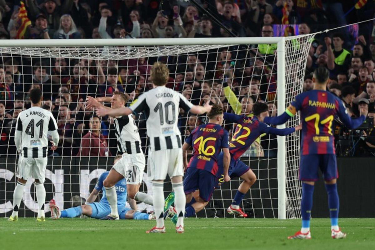 Barcelona's Spanish midfielder #22 Marc Bernal celebrates scoring his team0's second goal during the UEFA Champions League last 16 second leg football match between FC Barcelona and Newcastle United at the Camp Nou stadium in Barcelona, on March 18, 2026.  Lluis GENE / AFP