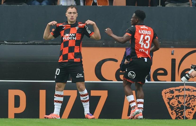 Lorient's French forward #10 Pablo Pagis (L) celebrates after scoring a goal  during the French L1 football match between FC Lorient and AS Monaco at the Stade du Moustoir in Lorient, western France, on September 27, 2025.  Fred TANNEAU / AFP