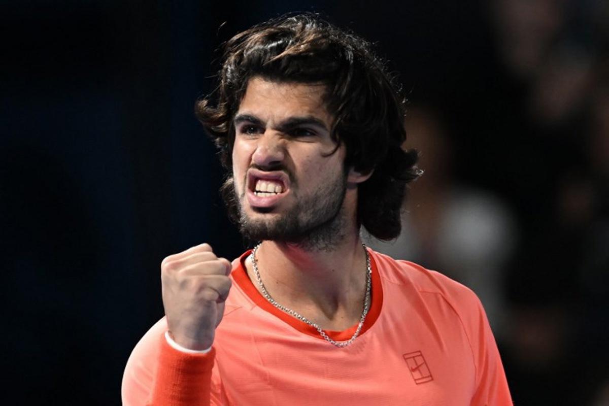 Spain's Carlos Alcaraz reacts after a point against Czech Republic's Jiri Lehecka in the men's singles final during the Japan Open tennis tournament at the Ariake Tennis Forest Park in Tokyo on October 6, 2026.  Rie KIKUCHI / AFP