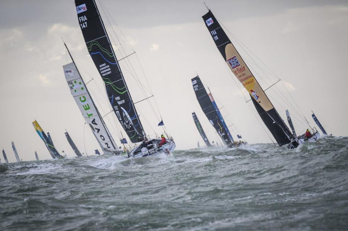 Class40 class monohulls sailing boat take off at the start during the 17th edition of the Transat Cafe L'Or, off the shores of Le Havre, north western France on October 26, 2025. Four open classes will take part in the race: IMOCA, Ocean Fifty, ULTIM and Class40. The Transat Cafe L'Or is a duo sailing race from Le Havre to Fort-de-France, in the French Caribbean island of Martinique. Class 40 monohulls Loic VENANCE / AFP