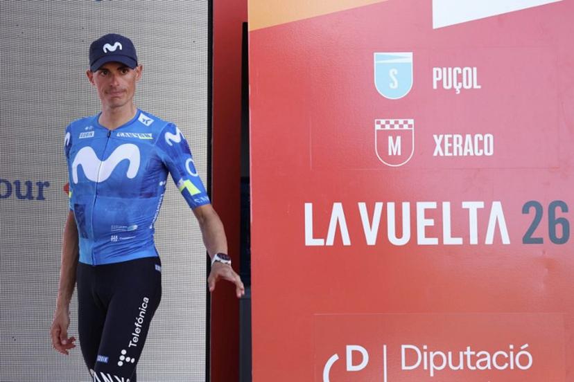 New overall race leader Team Movistar's Spanish rider Enric Mas enters the podium after the eighth stage of the Vuelta a Espana 2026, a 171 km race between Pucol and Xeraco on August 29, 2026.   Previous race leader Tadej Pogacar pulled out of the Vuelta a Espana on Saturday after a heavy fall 31km from the finish of a flat stage eight left him with shoulder and face injuries. Pogacar of Team UAE has won five Tour de France titles and a Giro d'Italia and was targetig his first overall victory on the Spanish 21-day race. Josep LAGO / AFP