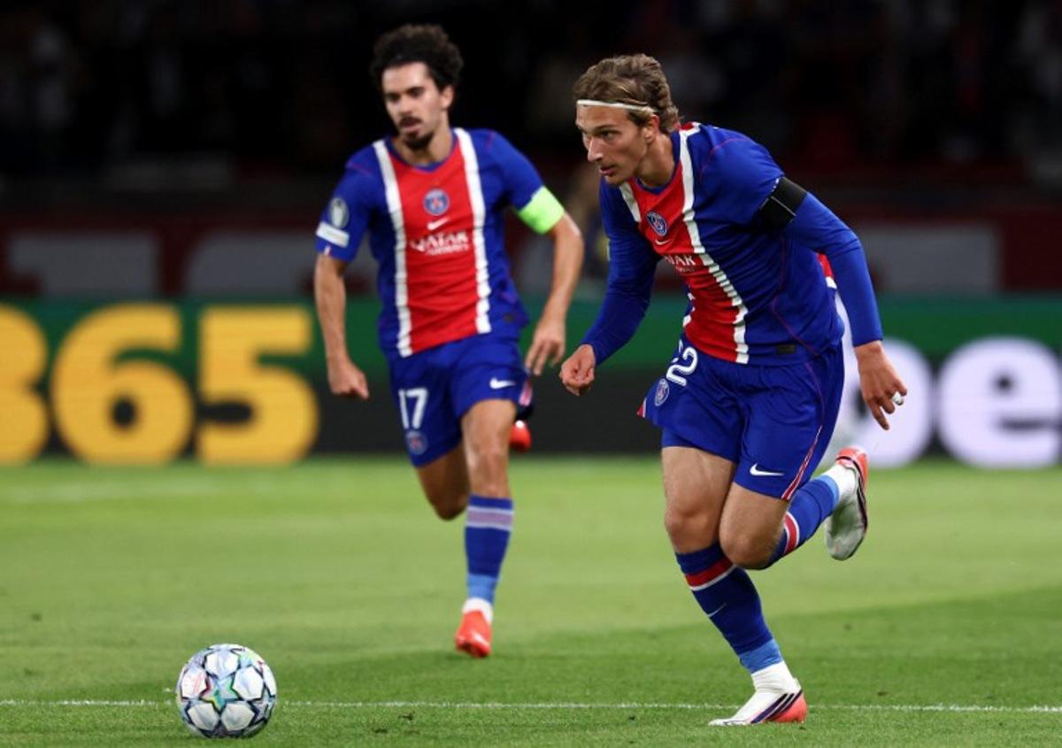 PSG's Belgian forward #22 Mika Godts runs with the ball during the UEFA Champions League, league phase, matchday 1, football match between Paris Saint-Germain (PSG) and Slovan Bratislava at the Parc des Princes Stadium in Paris on September 9, 2026.  FRANCK FIFE / AFP