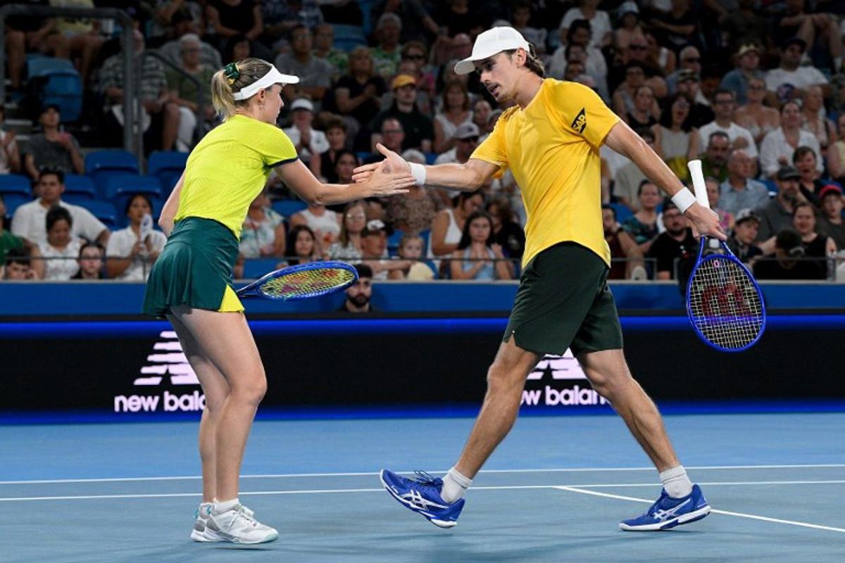 Australia's Alex de Minaur (R) and Storm Hunter celebrate a point against Czech Republic's Dalibor Svrcina and Miriam Skoch during their mixed doubles match at the United Cup tennis tournament on Ken Rosewall Arena in Sydney on January 6, 2026.  Izhar KHAN / AFP