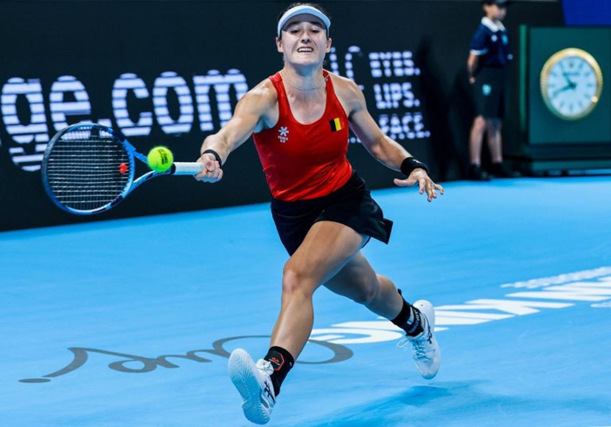 Belgium's Jana Otzipka hits a return to Ukraine's Anhelina Kalinina during their women's singles quarter-final match at the Billie Jean King Cup tennis tournament in Shenzhen, southern China's Guangdong province on September 24, 2026.  CN-STR / AFP