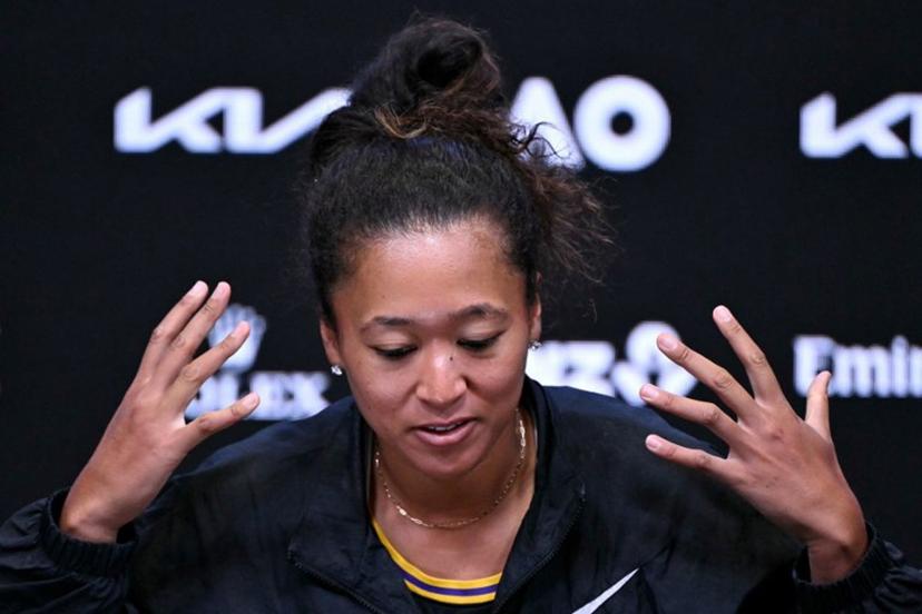 Japan's Naomi Osaka speaks during a press conference after winning her women's singles match against Romania's Sorana Cirstea on day five of the Australian Open tennis tournament in Melbourne on January 22, 2026.  WILLIAM WEST / AFP