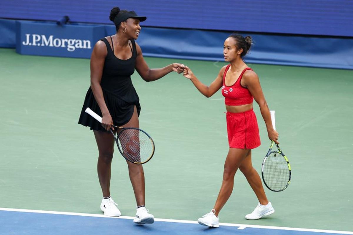 Canada's Leylah Fernandez (R) and USA's Venus Williams (L) celebrate a point during their women's doubles quarterfinal match against USA's Taylor Townsend and Czech Republic's Kateřina Siniaková at the US Open tennis tournament at the USTA Billie Jean King National Tennis Center in New York City on September 2, 2025.   CHARLY TRIBALLEAU / AFP
