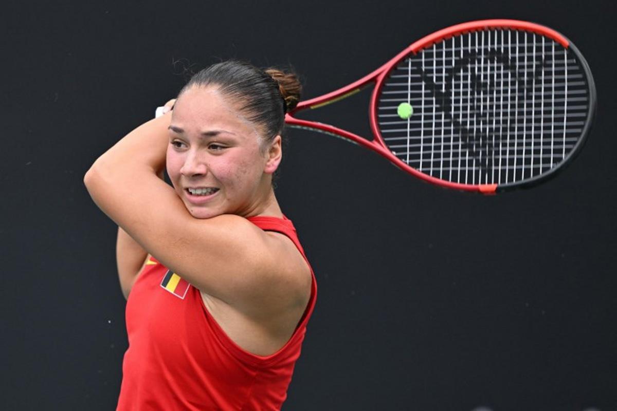 Belgium's Sofia Costoulas hits a return to China's Wang Xiyu during their women's singles match at the Billie Jean King Cup tennis play-offs at the Guangzhou Nansha International Tennis Center in Guangzhou, in south China's Guangdong province on November 17, 2024.  STR / AFP