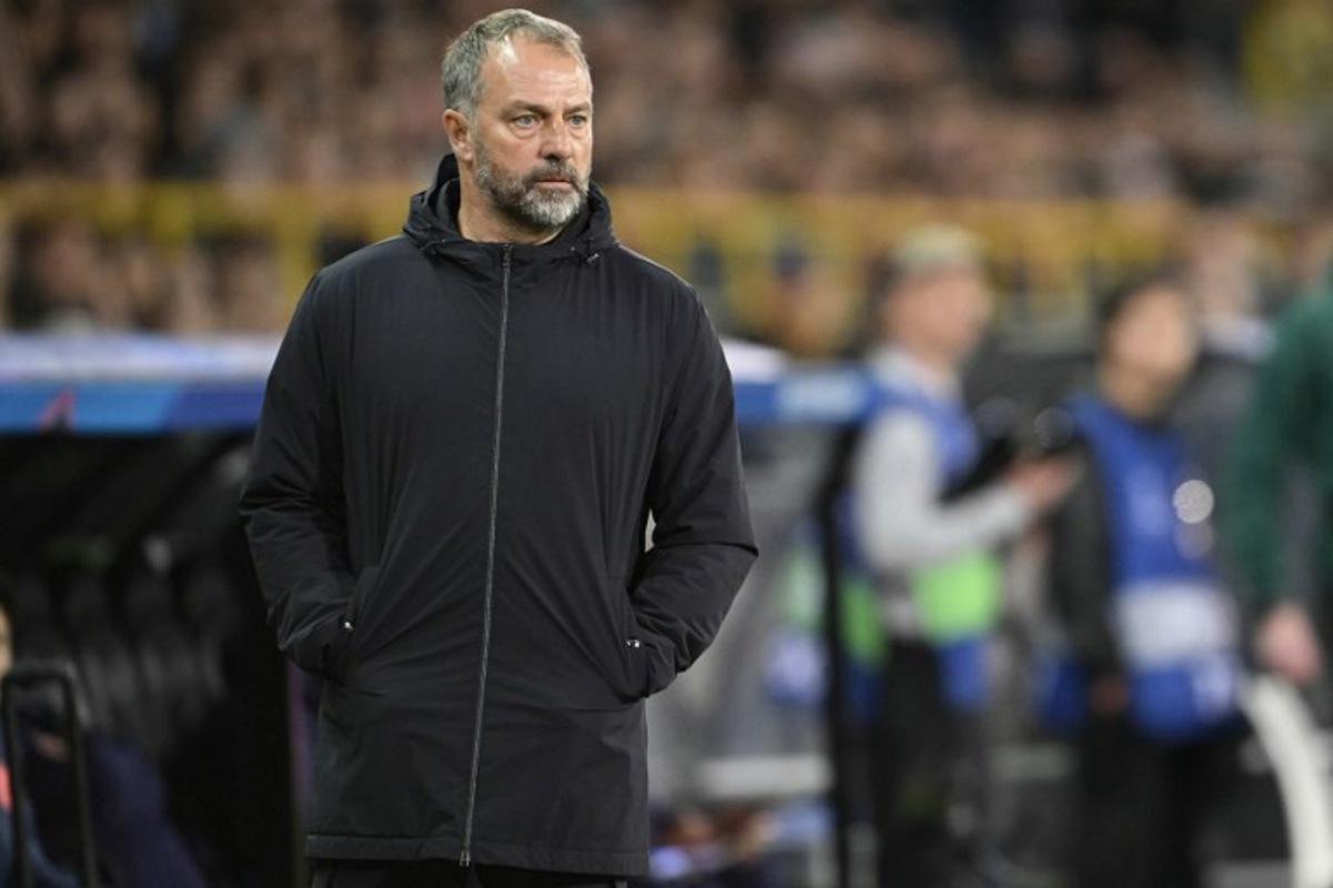 Barcelona's German coach Hans-Dieter Flick reacts from the sideline during the UEFA Champions League league phase day 4 football match between Club Brugge and FC Barcelona at Jan Breydelstadion stadium, in Bruges, on November 5, 2025.  NICOLAS TUCAT / AFP