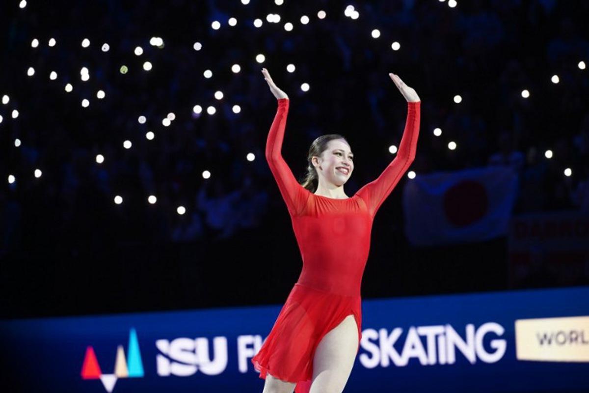 Bronze-medal winner Belgium's Nina Pinzarrone celebrates after winning the women's free skating program of the 2026 ISU Figure Skating World Championships in Prague, Czech Republic on March 27, 2026.  Michal Cizek / AFP