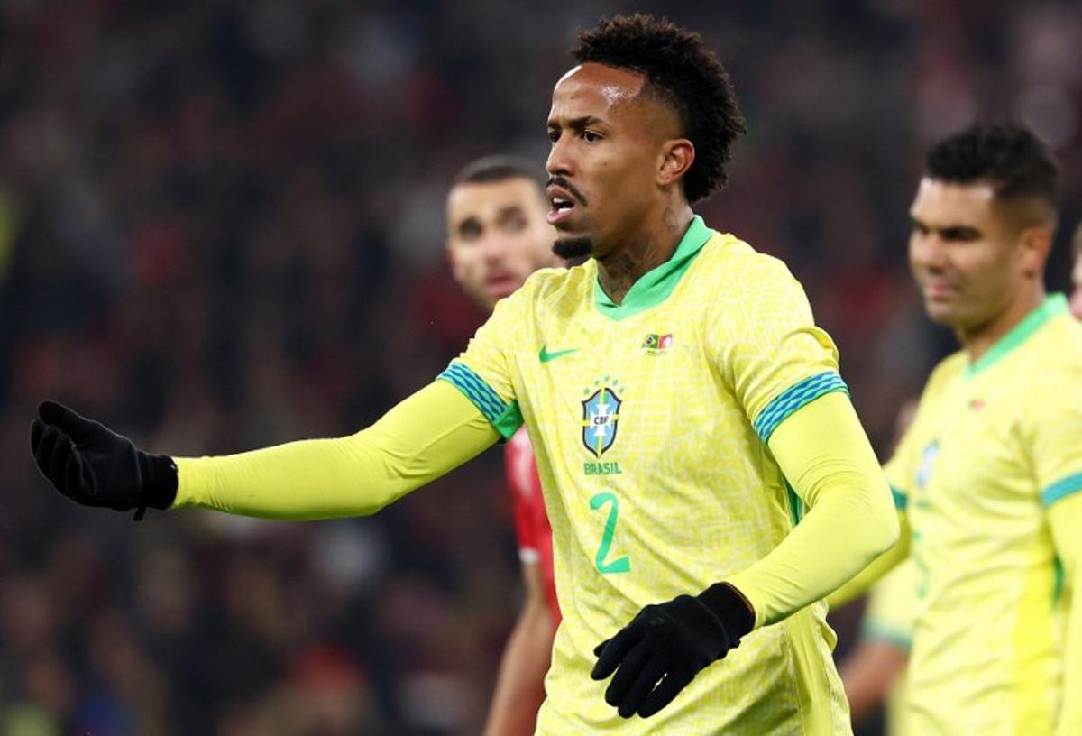Brazil's midfielder #02 Eder Militao reacts during the International friendly football match between Brazil and Tunisia at Stade Pierre-Mauroy, in Villeneuve-d'Ascq, northern France, on November 18, 2025.  FRANCK FIFE / AFP