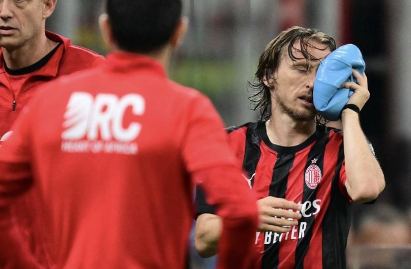AC Milan's Croatian midfielder #14 Luka Modric leaves the pitch after being injured during the Italian Serie A football match between AC Milan and Juventus FC at the San Siro stadium in Milan, northern Italy, on April 26, 2026.  Stefano RELLANDINI / AFP