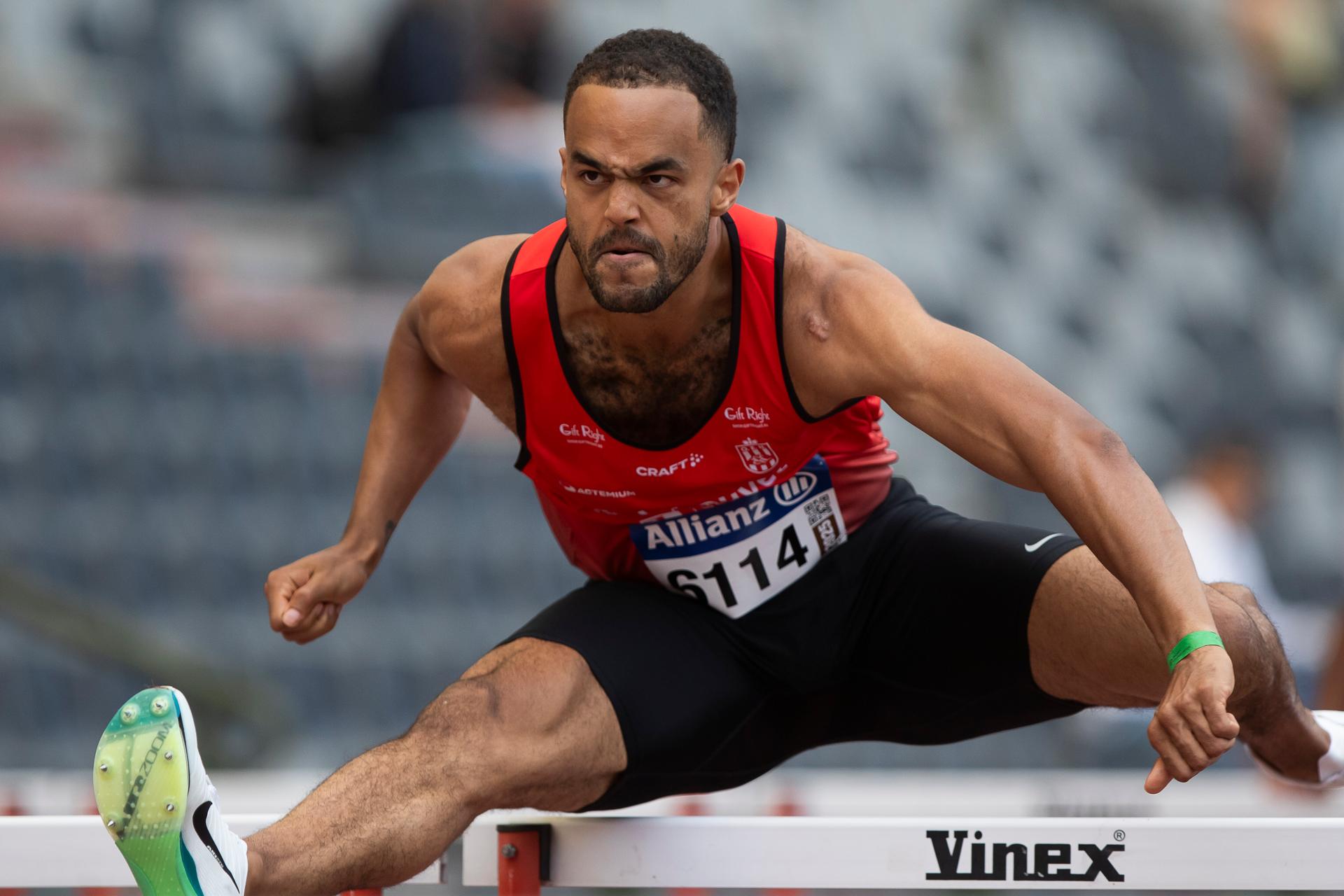 Belgian Michael Obasuyi pictured in action during the 110m hurdles race, at the Belgian athletics championships, Sunday 03 August 2025 in Brussels. The Belgian championships take place from 2-3 August, 2025. BELGA PHOTO KRISTOF VAN ACCOM