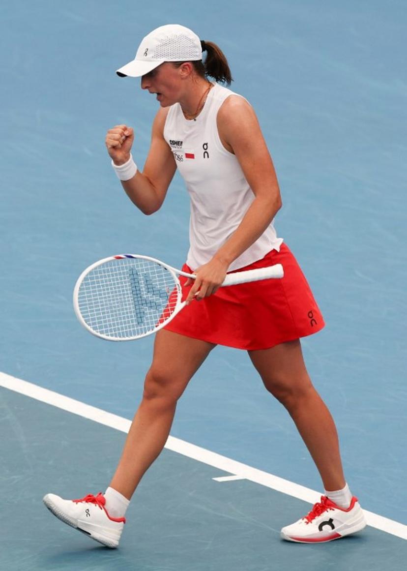 Poland's Iga Swiatek celebrates victory against Netherlands' Suzan Lamens after her women's singles match at the United Cup tennis tournament in Sydney on January 7, 2026.  Izhar KHAN / AFP