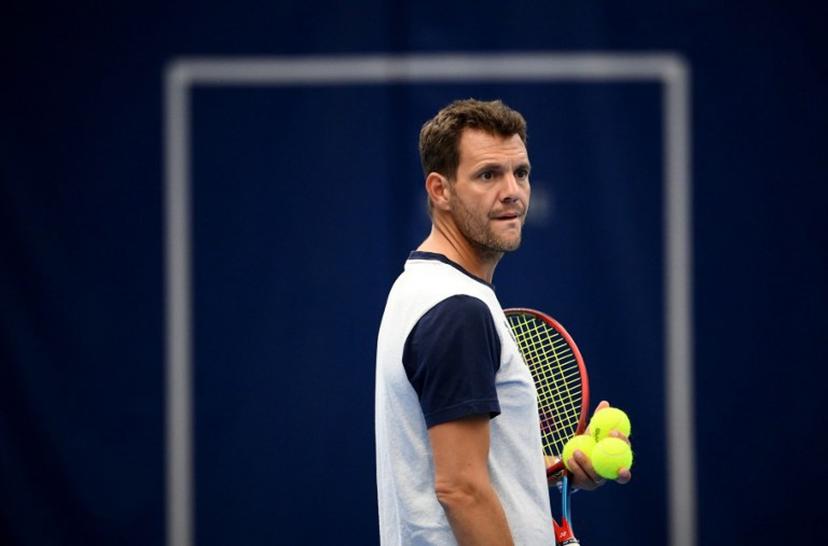 France's Paul-Henri Mathieu looks on a training session prior to the upcoming Davis Cup tournament in Germany, on September 9, 2022, in Paris.   The French Davis Cup team will play the group phase from September 14 to 18 in Hamburg. FRANCK FIFE / AFP