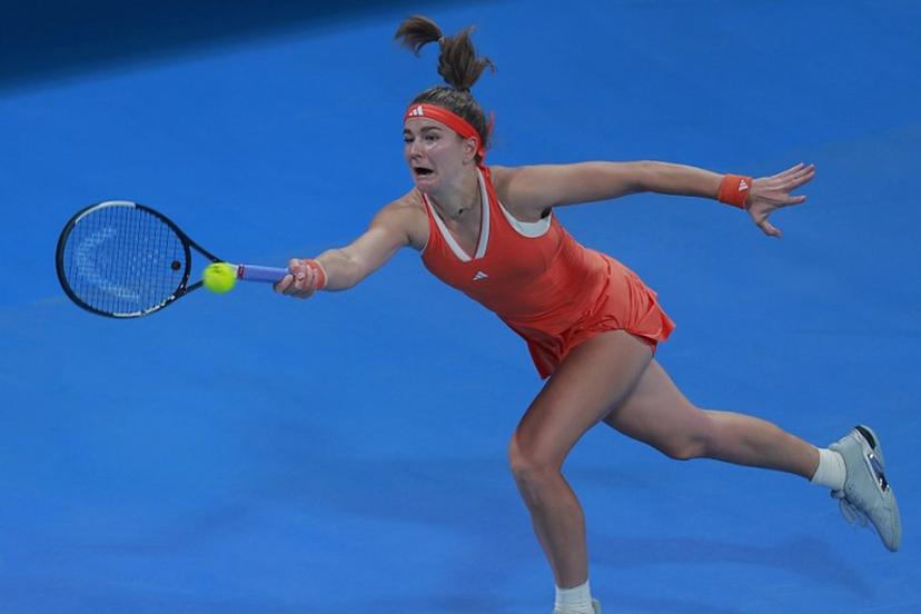 Czech Republic's Karolina Muchova hits a return against Greece's Maria Sakkari during their women's singles semi-final match at the Qatar Open tennis tournament in Doha on February 13, 2026.  Karim JAAFAR / AFP
