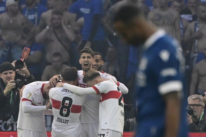 Stuttgart's team celebrates the 0-3 during the German Cup (DFB Pokal) final football match between Arminia Bielefeld and VfB Stuttgart at the Olympic Stadium in Berlin on May 24, 2025.  John MACDOUGALL / AFP