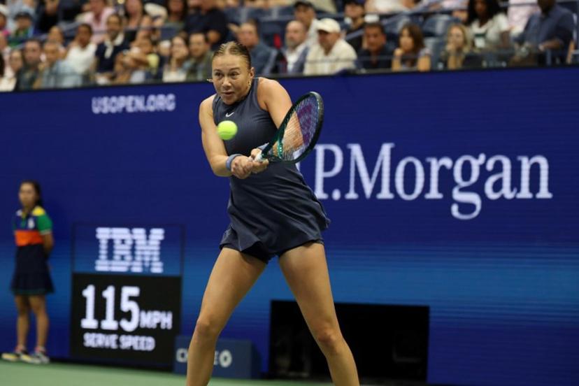 USA's Amanda Anisimova plays a shot to Belarus's Aryna Sabalenka in the women's singles final tennis match on day fourteen of the US Open tennis tournament at the USTA Billie Jean King National Tennis Center in New York City on September 6, 2025.  TIMOTHY A.CLARY / AFP