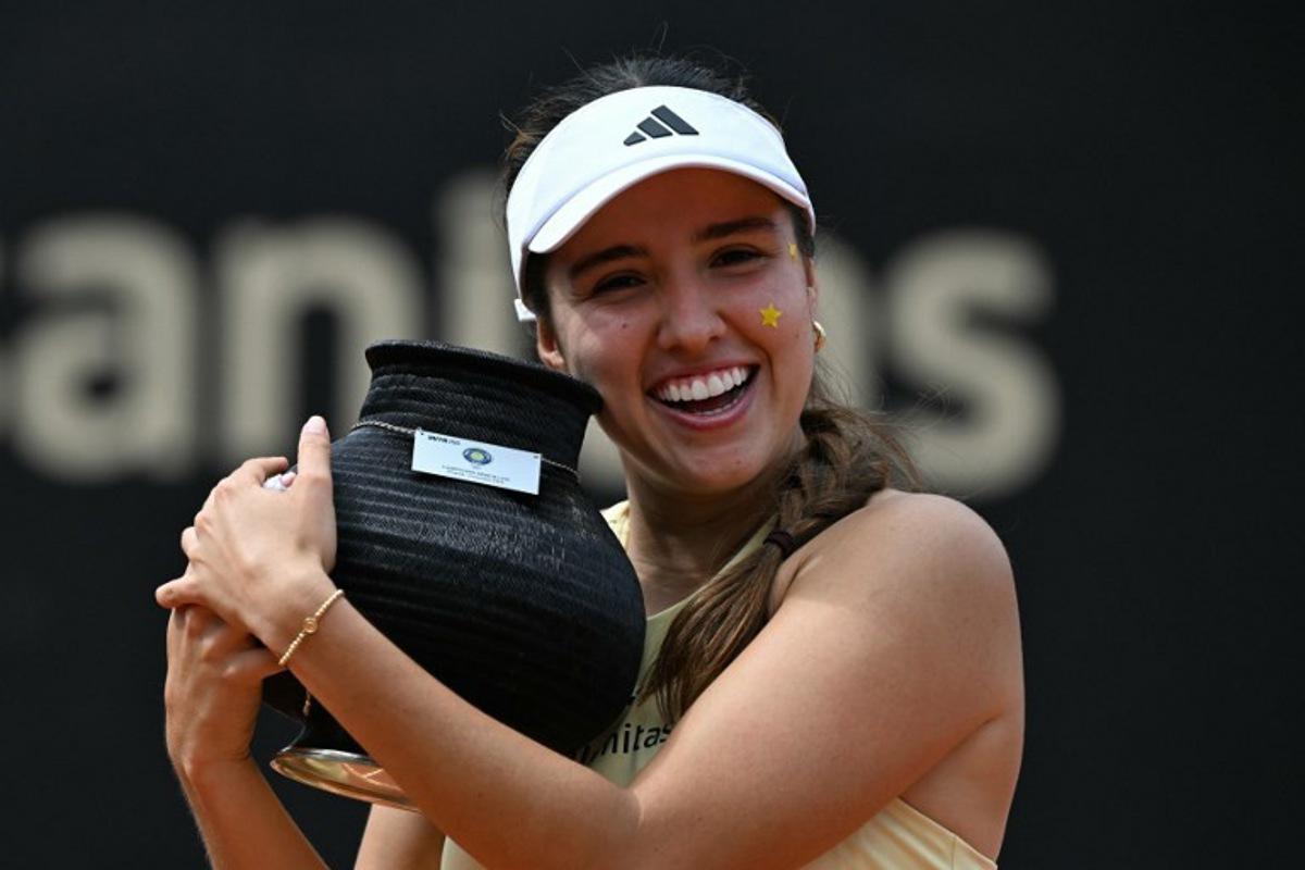 Colombia's Camila Osorio holds the trophy after defeating Poland's Katarzyna Kawa during the WTA Bogota 2025 women's singles final match in Bogota on April 6, 2025.   Luis ACOSTA / AFP
