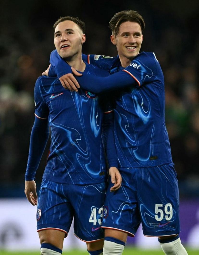 Chelsea's Harvey Vale (L) and Chelsea's Harrison Murray-Campbell celebrate after the UEFA Europa Conference League football match between Chelsea and Shamrock Rovers at Stamford Bridge in London on December 19, 2024. Chelsea won the match 5-1.  JUSTIN TALLIS / AFP