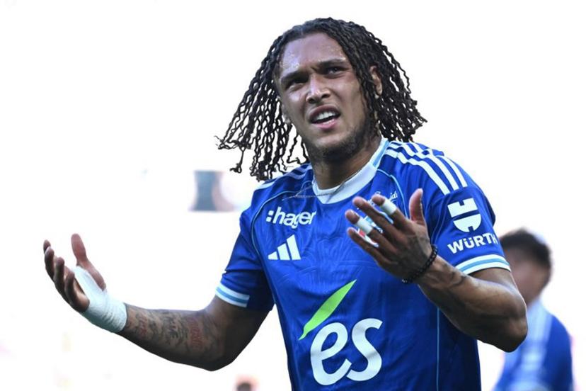 Strasbourg's Belgian midfielder #07 Diego Moreira reacts after his team's first goal during the French L1 football match between RC Strasbourg Alsace and FC Nantes at Stade de la Meinau in Strasbourg, eastern France on August 24, 2025.   SEBASTIEN BOZON / AFP