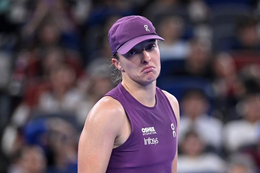 Poland's Iga Swiatek reacts after a point during her women's singles semi-final match against Poland's Maja Chwalinska at the Wuhan Open tennis tournament in Wuhan, China's Hubei province on October 17, 2026.   WANG Zhao / AFP