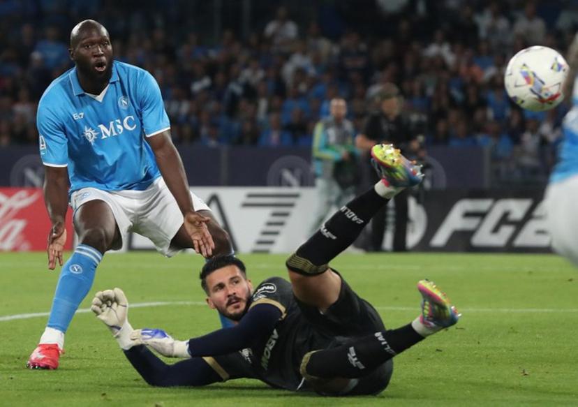Napoli's Belgian forward #11 Romelu Lukaku reacts after missing an opportunity to score in  front of Cagliari's Albanian goalkeeper #71 Alen Sherri during the Italian Serie A football match between Napoli and Cagliari at the Diego Armando Maradona stadium in Naples on May 23, 2025.  Carlo Hermann / AFP
