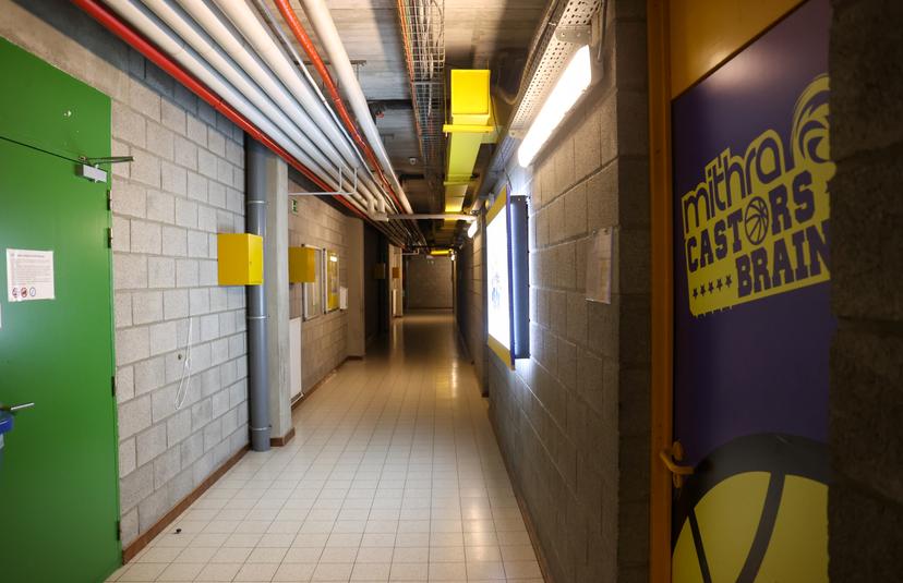 Illustration picture shows the corridor of the changing rooms in the empty hall that should have been the location of the third cancelled basketball match between Castors Braine and Namur Capitale, Wednesday 28 April 2021 in Braine-L'Alleud, in the Play-offs finals in the Belgian first division basket championships. The two previous matches also had to be cancelled due to a coronavirus break-out in the Castors Braine team. Namur Capitale has been declared Champion by the Basketball Federation. BELGA PHOTO VIRGINIE LEFOUR