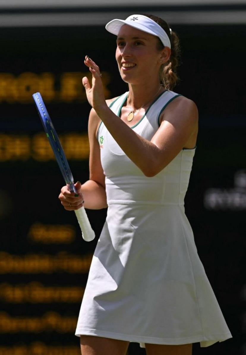 Belgium's Elise Mertens celebrates winning against Kazakhstan's Elena Rybakina during their women's singles third round tennis match on the sixth day of the 2026 Wimbledon Championships at The All England Lawn Tennis and Croquet Club in Wimbledon, southwest London, on July 4, 2026.  Glyn KIRK / AFP