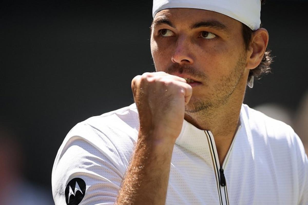 US player Taylor Fritz celebrates after winning a point against Spain's Alejandro Davidovich Fokina during their men's singles third round tennis match on the fifth day of the 2025 Wimbledon Championships at The All England Lawn Tennis and Croquet Club in Wimbledon, southwest London, on July 4, 2025.  HENRY NICHOLLS / AFP