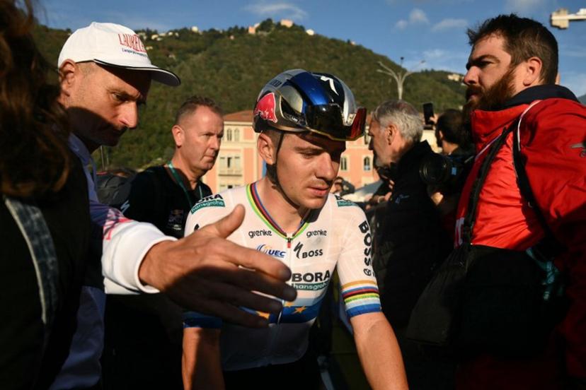 Red Bull-Bora-Hansgrohe's Belgian rider Remco Evenepoel reacts after crossing the finish line of the 120th edition of the Giro di Lombardia (Tour of Lombardy) between Bergamo and Como on October 10, 2026.  Marco BERTORELLO / AFP