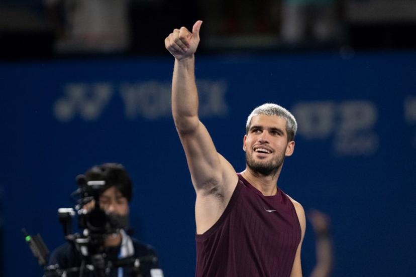 Spain's Carlos Alcaraz reacts after his men's singles match against Norway's Casper Ruud at the ATP Japan Open tennis tournament in Tokyo on September 29, 2025.  Philip FONG / AFP